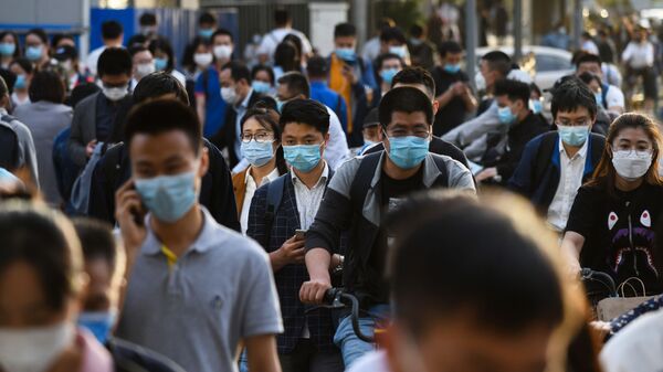 Gente en las calles de Pekín, China - Sputnik Mundo
