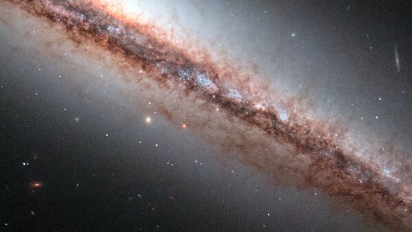 Galaxia NGC 4217 - Sputnik Mundo