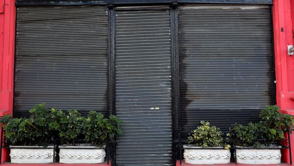 Una tienda cerrada en Buenos Aires, Argentina - Sputnik Mundo