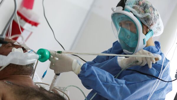 Un paciente con COVID-19 en un hospital de Buenos Aires, Argentina - Sputnik Mundo