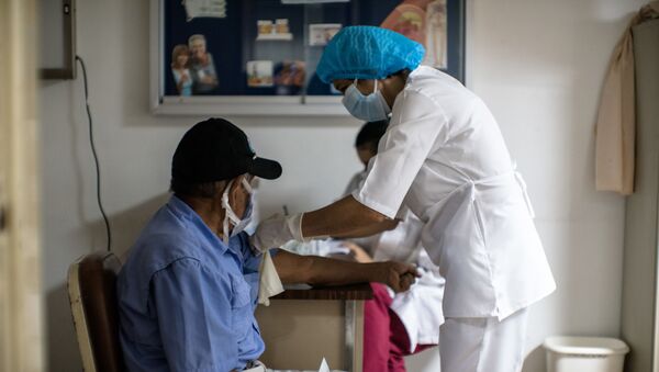 Chequeo de pacientes recuperados del COVID-19 en el hospital Dr. Domingo Luciani. - Sputnik Mundo