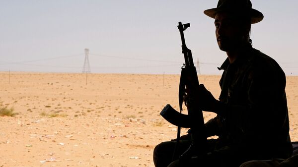 Un miembro del Ejército de Hatar en Libia - Sputnik Mundo