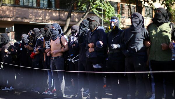 Manifestantes en México - Sputnik Mundo