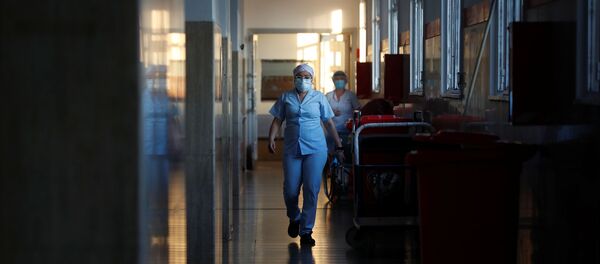 Médicos en un hospital durante el brote de coronavirus en Argentina Médicos en un hospital durante el brote de coronavirus en Argentina - Sputnik Mundo