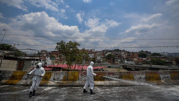 Trabajos de desinfección de las calles de Caracas, Venezuela - Sputnik Mundo