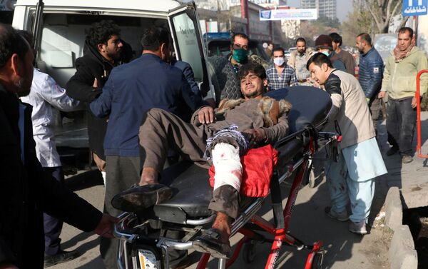 Un hombre herido en el ataque en Kabul - Sputnik Mundo