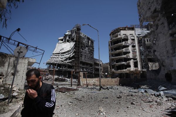 La región de Al-Khalidiya en la ciudad de Homs (Siria), controlada por combatientes del Ejército Libre de Siria - 22 de abril de 2012.  - Sputnik Mundo