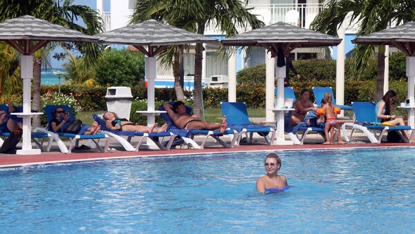 Turistas rusos en las playas de Cayo Coco Turistas rusos en las playas de Cayo Coco - Sputnik Mundo