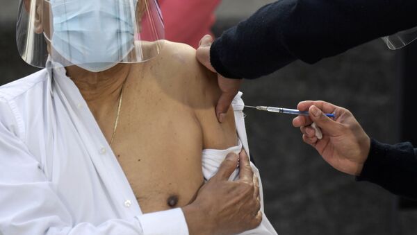 México comienza la vacunación contra COVID-19, el 24 de diciembre de 2020 - Sputnik Mundo