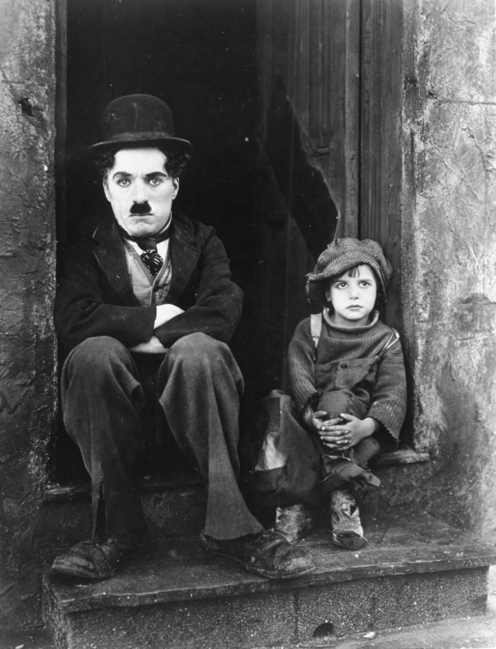 Charles Chaplin y Jackie Coogan durante la grabación de 'El chico' - Sputnik Mundo, 1920, 11.02.2021