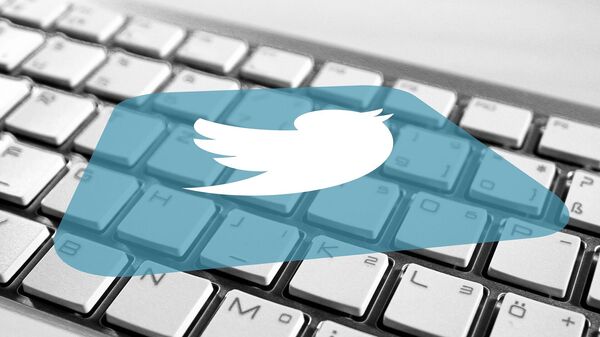 El logo de Twitter sobre un teclado - Sputnik Mundo