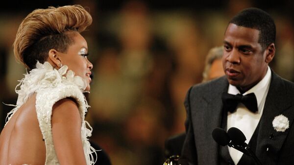Los cantantes estadounidenses Rihanna y Jay-Z - Sputnik Mundo