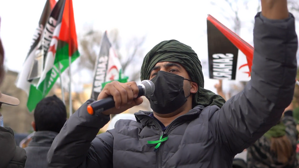 Activistas saharauis denuncian la ocupación del Sahara Occidental frente a la embajada marroquí en Madrid - Sputnik Mundo