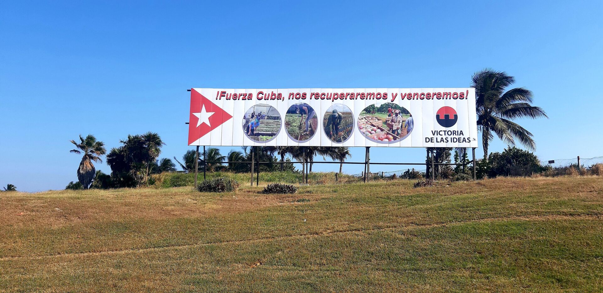 Carteles y consignas se colocan en varios puntos de las ciudades cubanas  - Sputnik Mundo, 1920, 01.03.2021