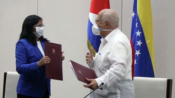 Vicepresidenta de Venezuela y viceprimer ministro de Cuba intercambian Convenio Integral de Cooperación Cuba-Venezuela - Sputnik Mundo