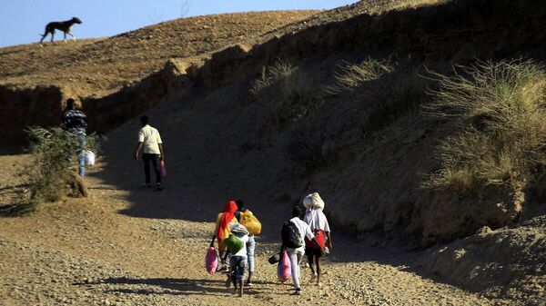 Etiopios que huyen de la región de Tigray, Etiopía - Sputnik Mundo