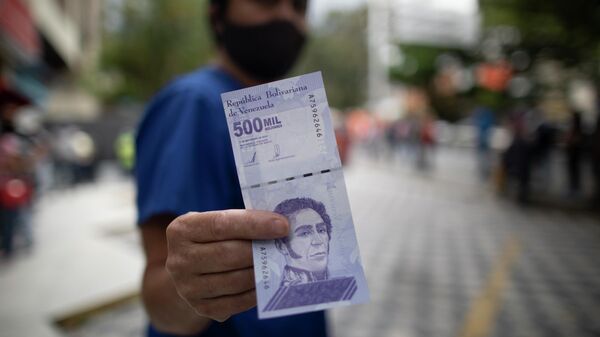 Un billete de 500 mil bolívares venezolanos - Sputnik Mundo