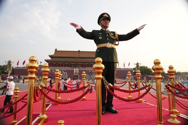 Una orquesta militar en la celebración del 100 aniversario del Partido Comunista de China en Pekín. - Sputnik Mundo