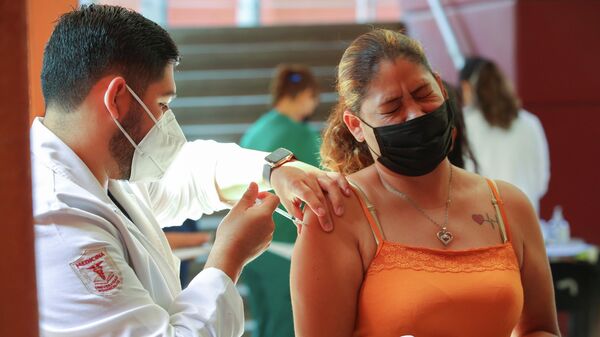 Vacunación contra el coronavirus en la frontera México-EEUU - Sputnik Mundo