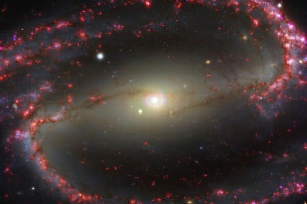 Las nubes de gas caliente en la galaxia NGC 1300 - Sputnik Mundo
