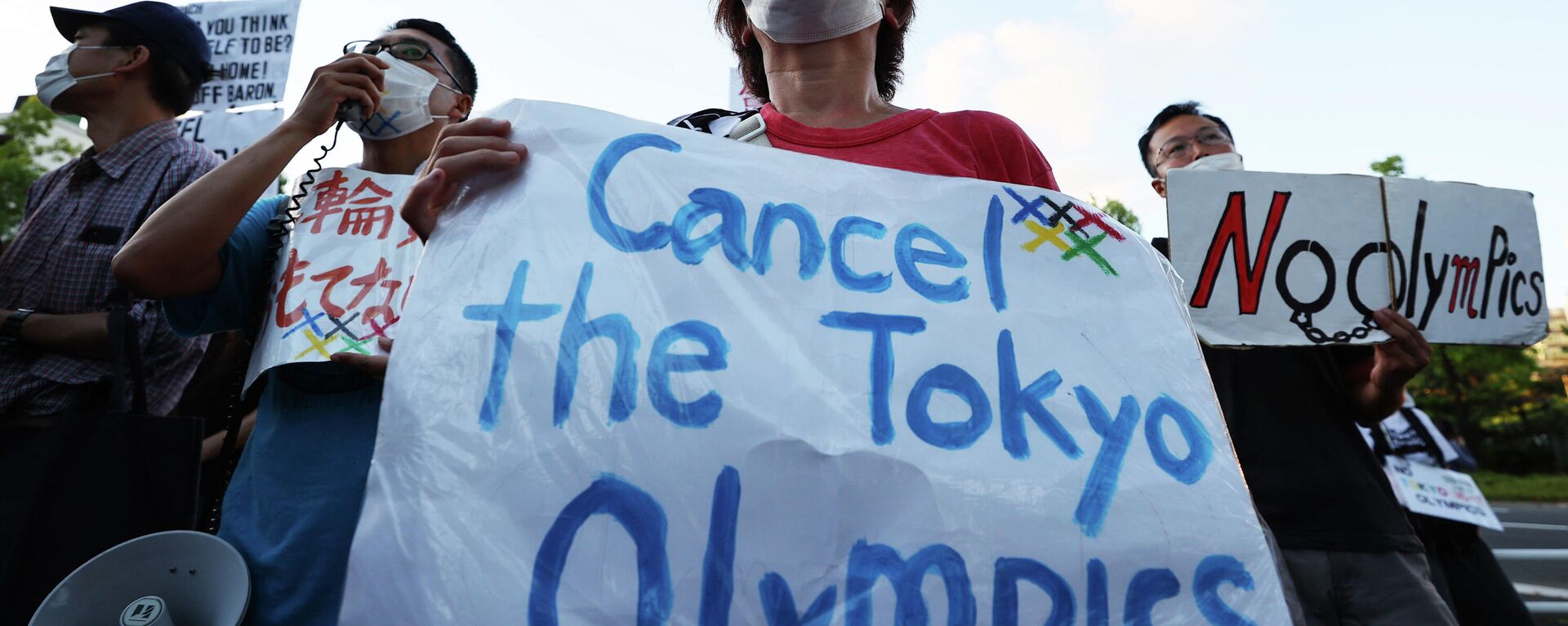 Manifestantes protestan contra la realización de los Juegos Olímpicos de Tokio - Sputnik Mundo, 1920, 23.07.2021