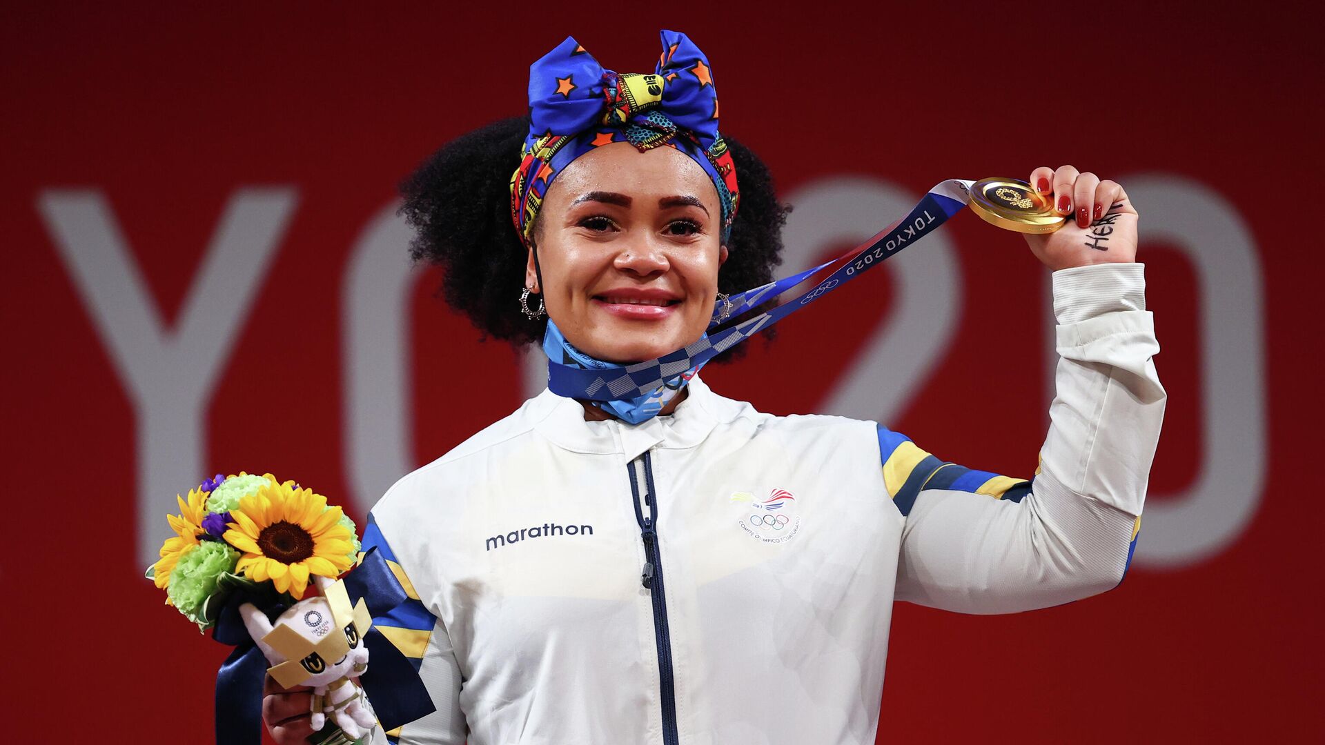 La halterófila ecuatoriana Neisi Dajomes con su medalla de oro, Tokio, el 1 de agosto de 2021 - Sputnik Mundo, 1920, 01.08.2021
