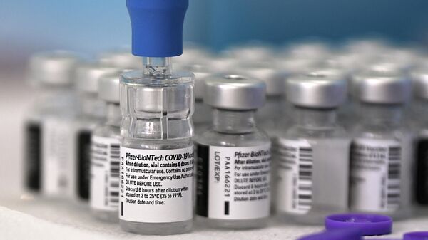 Vacuna contra COVID-19 de Pfizer - Sputnik Mundo