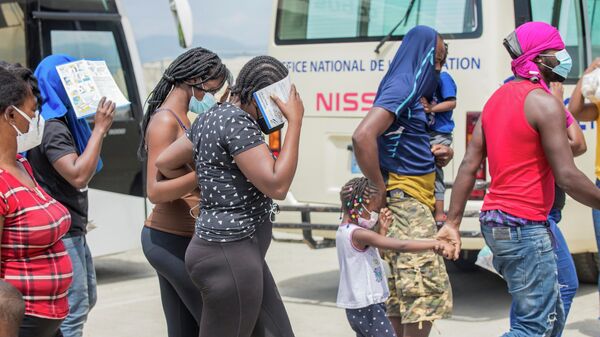 Migrantes haitianos - Sputnik Mundo