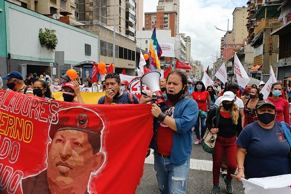 Pobladores exigen en las calles de Caracas poner fin a la criminalización de los ocupantes de inmuebles desocupados - Sputnik Mundo