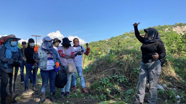 La sexta Brigada Nacional de búsqueda se organiza para comenzar su trabajo de localización de fosas clandestinas en el municipio de Yautepec, Morelos - Sputnik Mundo