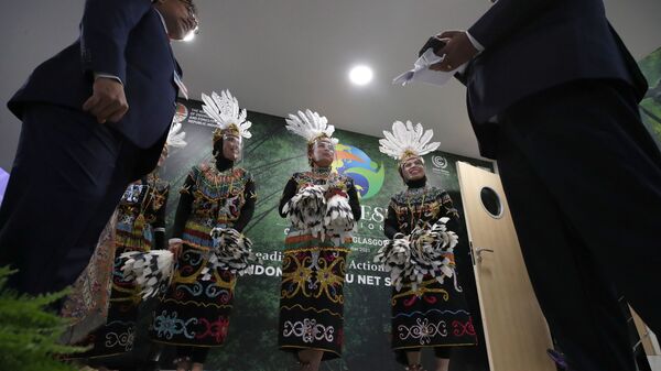  Танцоры традиционного индонезийского танца на конференции ООН COP26 в Глазго - Sputnik Mundo