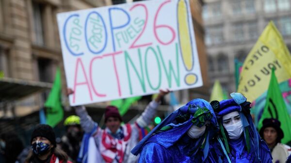 Manifestaciones durante la cumbre del clima en Glasgow - Sputnik Mundo