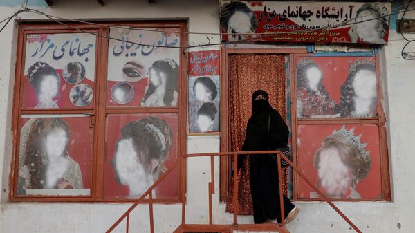Una mujer en Kabul - Sputnik Mundo