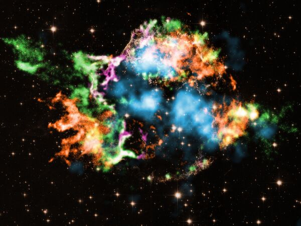 Cassiopeia A, un remanente de supernova en la constelación de Casiopea. Imagen tomada por el observatorio de rayos X Chandra de la NASA. - Sputnik Mundo