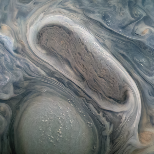 Una tormenta en Júpiter, registrada por la nave espacial Juno, lanzada por la NASA a laórbita de este planeta en 2016. - Sputnik Mundo