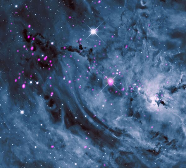 Unas jóvenes estrellas en la nebulosa Laguna registradas por el observatorio de rayos X Chandra de la NASA - Sputnik Mundo