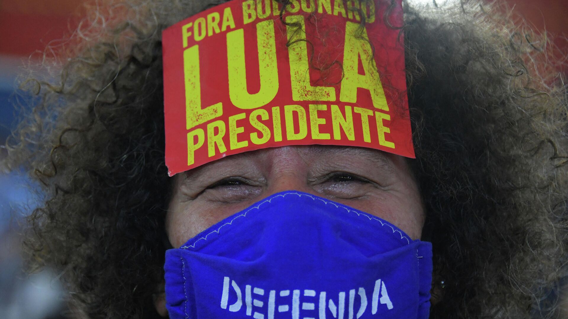 Una persona en el mítin preelectoral con Lula - Sputnik Mundo, 1920, 28.12.2021