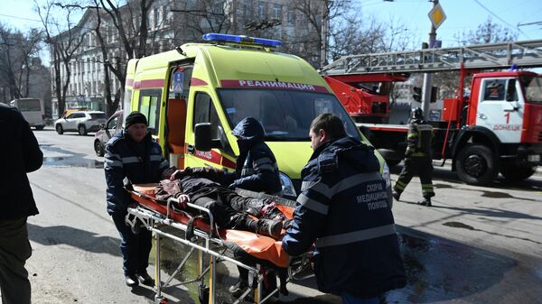 Evacuación de las víctimas del ataque con misil balístico Tochka-U en Donetsk - Sputnik Mundo