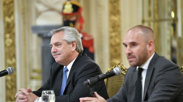 El presidente argentino, Alberto Fernández, y el ministro de Economía, Martín Guzman - Sputnik Mundo