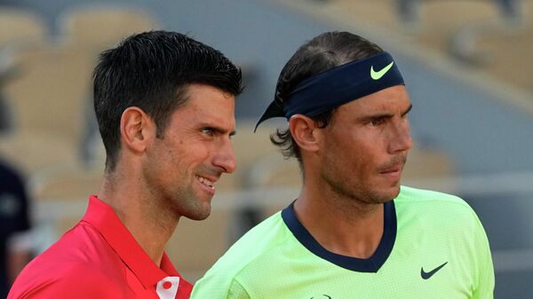 Rafael Nadal y Novak Djokovic - Sputnik Mundo