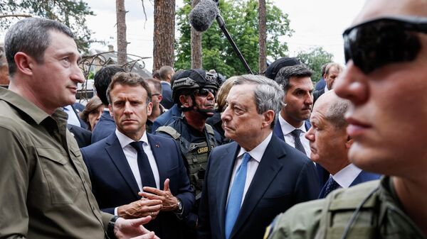 El primer ministro de Italia, Mario Draghi, el presidente de Francia, Emmanuel Macron, y el canciller federal de Alemania, Olaf Scholz, en Ucrania - Sputnik Mundo