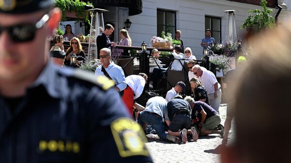 Una mujer muere acuchillada en un acto político en Suecia - Sputnik Mundo
