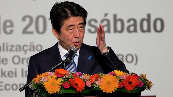 El exprimer ministro japonés Shinzo Abe durante un evento en Brasil en 2014 - Sputnik Mundo