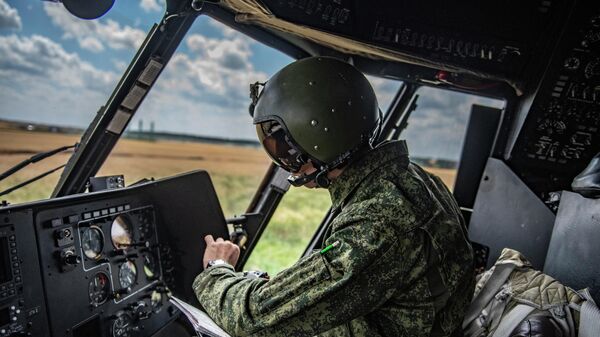 Los pilotos de helicópteros militares rusos
 - Sputnik Mundo