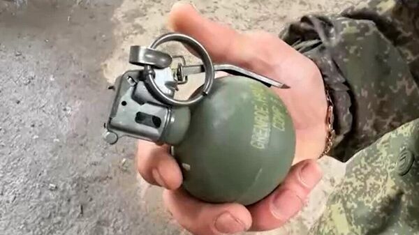 Una granada de producción estadounidense encontrada durante el conflicto en Ucrania - Sputnik Mundo