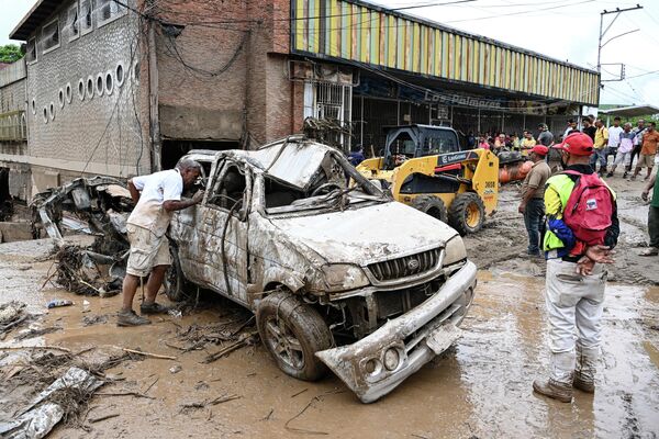 Las consecuencias de la inundación y el deslizamiento de tierra en Las Tejerias, Aragua. - Sputnik Mundo