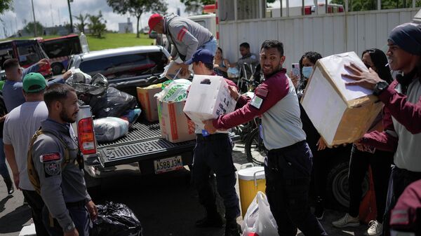 Ayuda humanitaria por la inundación en Venezuela - Sputnik Mundo