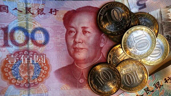 El rublo y el yuan, monedas de Rusia y China - Sputnik Mundo