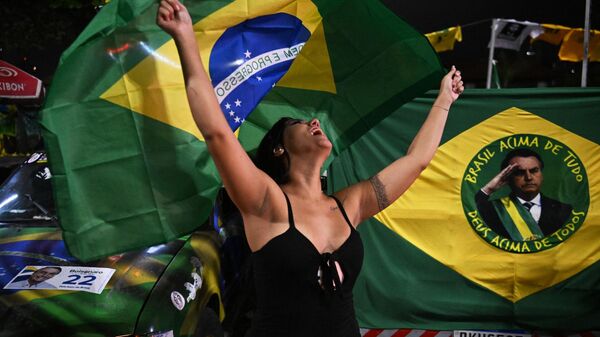 Simpatizante de Jair Bolsonaro durante un acto de apoyo al presidente, en Río de Janeiro (foto de archivo) - Sputnik Mundo