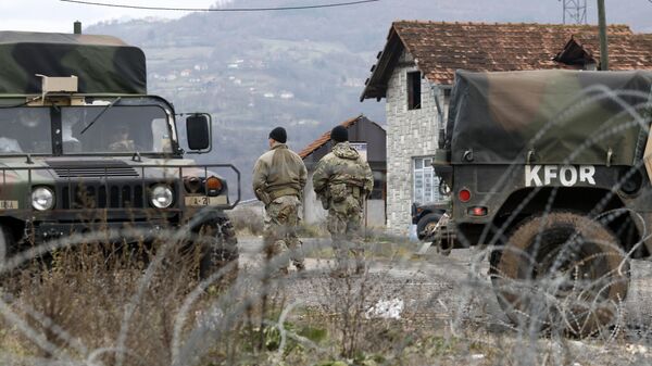 Soldados estadounidenses del comando del contingente de la OTAN en Kosovo (KFOR) - Sputnik Mundo